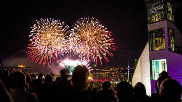 People watching fireworks from the Musée de la civilisation